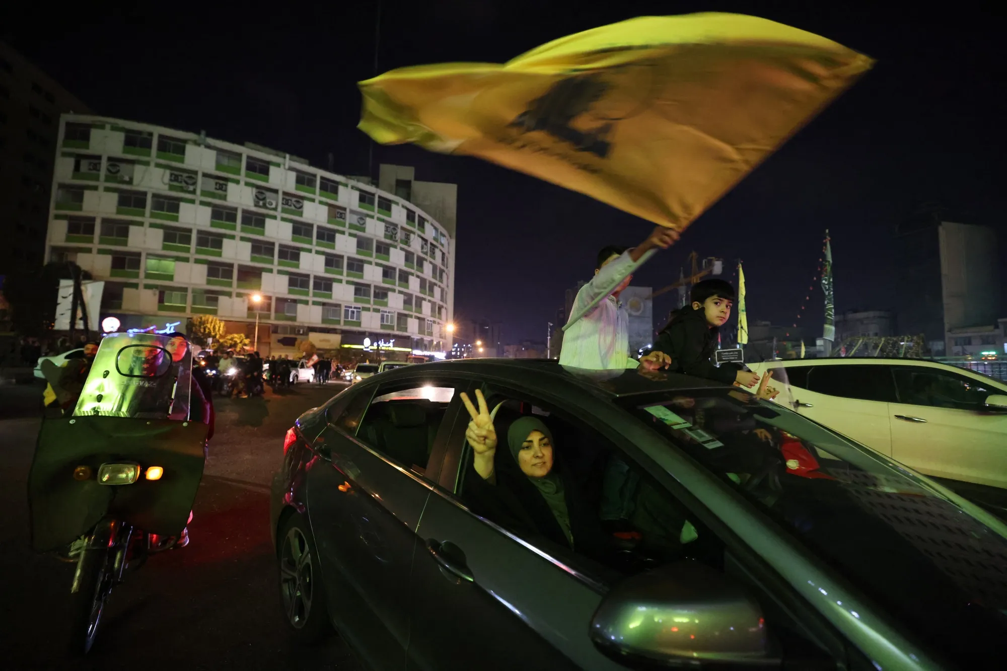 Demonstrators celebrate during a rally in Tehran on Oct. 1.