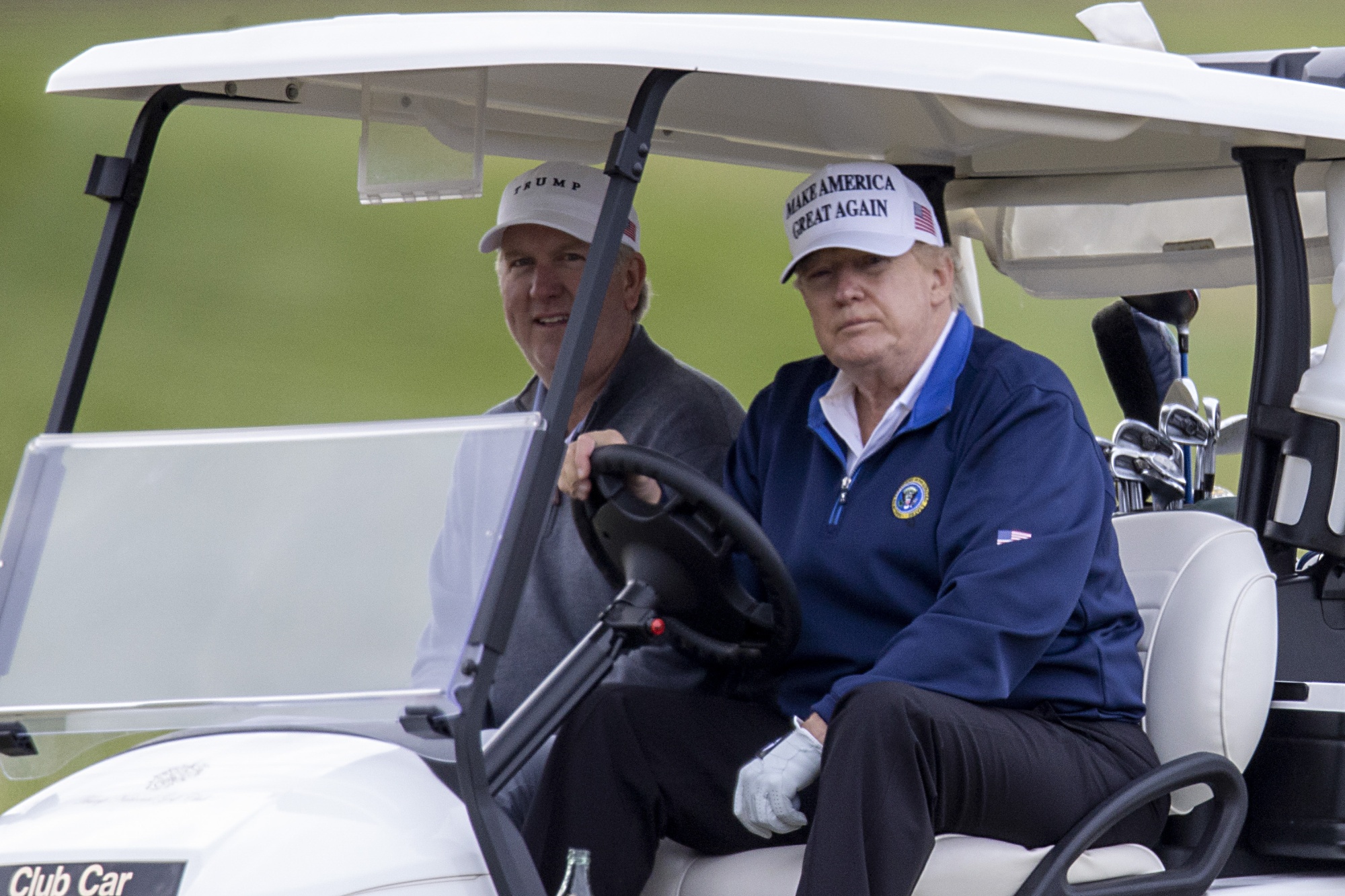 Donald Trump golfs on Sunday.