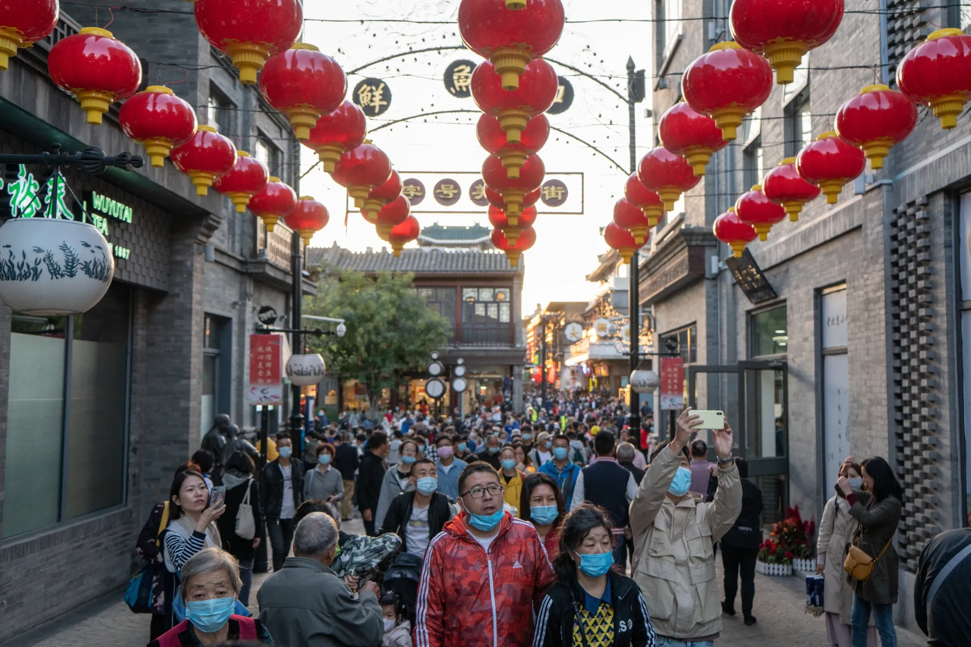 Visitors walk in Beijing’s Qianmen district during Golden Week, on Oct. 4.