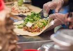 Workers prepare lunch orders at a Chipotle&nbsp;in New York.