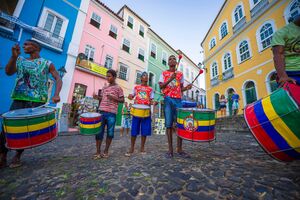 SALVADOR, BRAZIL - CIRCA FEBRUARY, 2018: A group of young Brazilian drummers make their way around the colorful buildings of the Pelourinho area. Image shot 02/2018. Exact date unknown.
