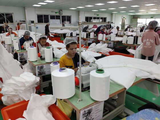 A 5,000% Surge Makes Medical-Wear Firm Singapore’s Top Stock