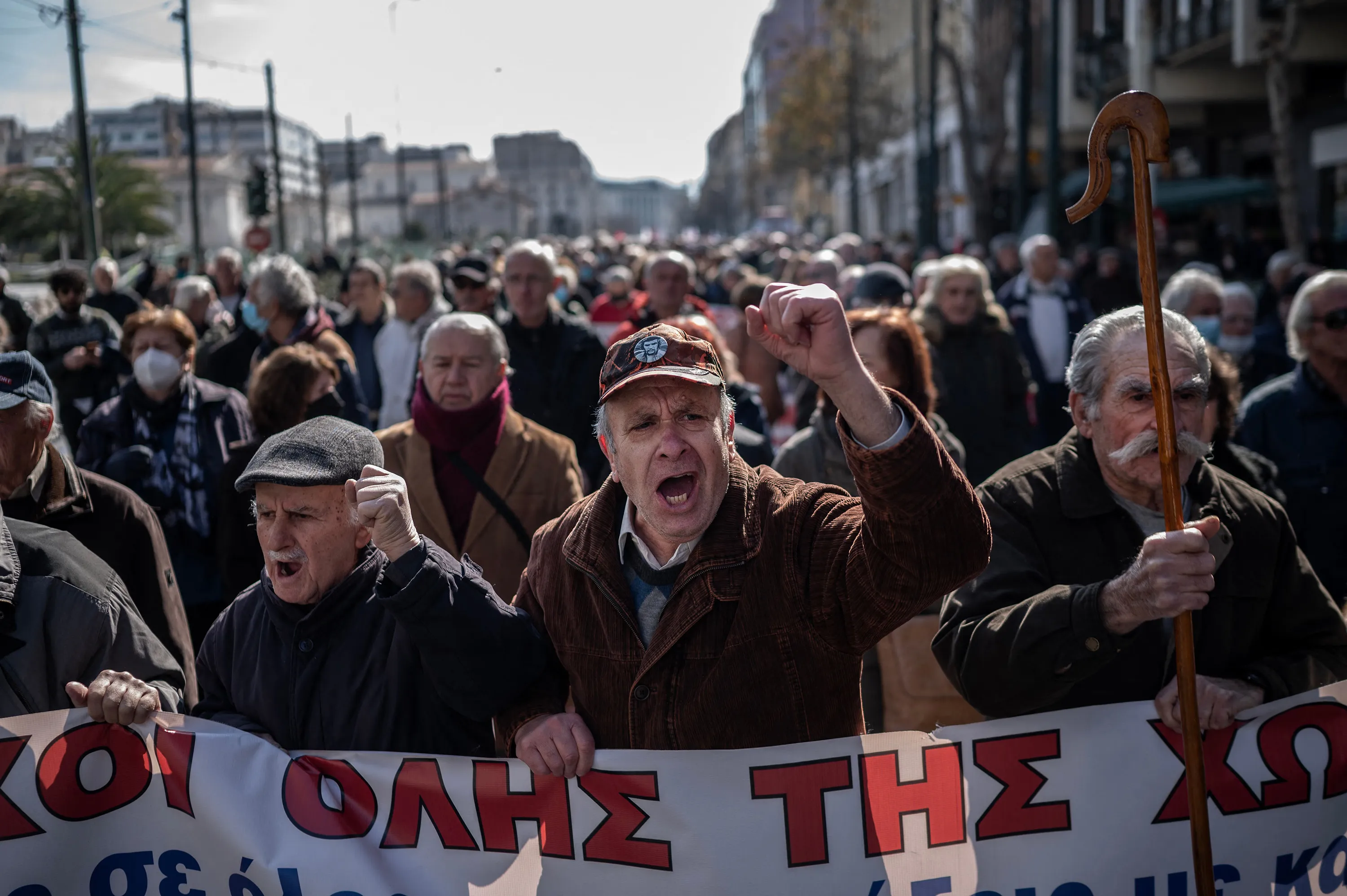 Pensioners shout slogans during a demonstration in central Athens, on February 14, 2023, demanding an increase in pension payments to cope with soaring inflation and energy costs.