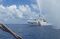 In this Sept.23, 2015 photo provided by Renato Etac, Chinese Coast Guard members approach Filipino fishermen as they confront them off Scarborough Shoal at South China Sea, also called the West Philippine Sea, in northwestern Philippines. More than once, Chinese coast guardsmen approached Etac's boat and pointed their rifles at him, but he says he knew they would not fire and risk starting a war.(Renato Etac via AP)