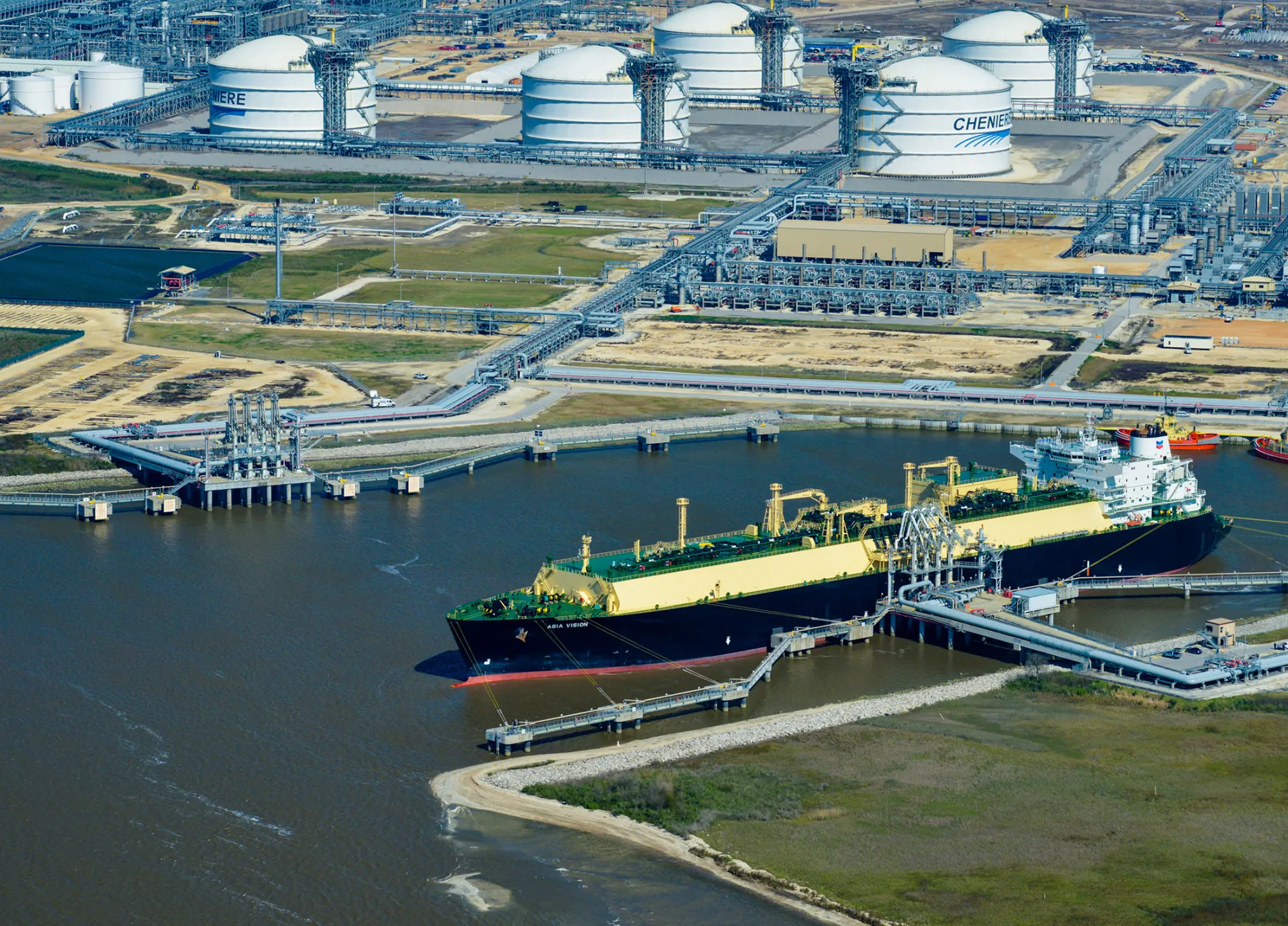 A ship sits docked at the Cheniere Energy Inc. terminal near Sabine Pass, Texas.
