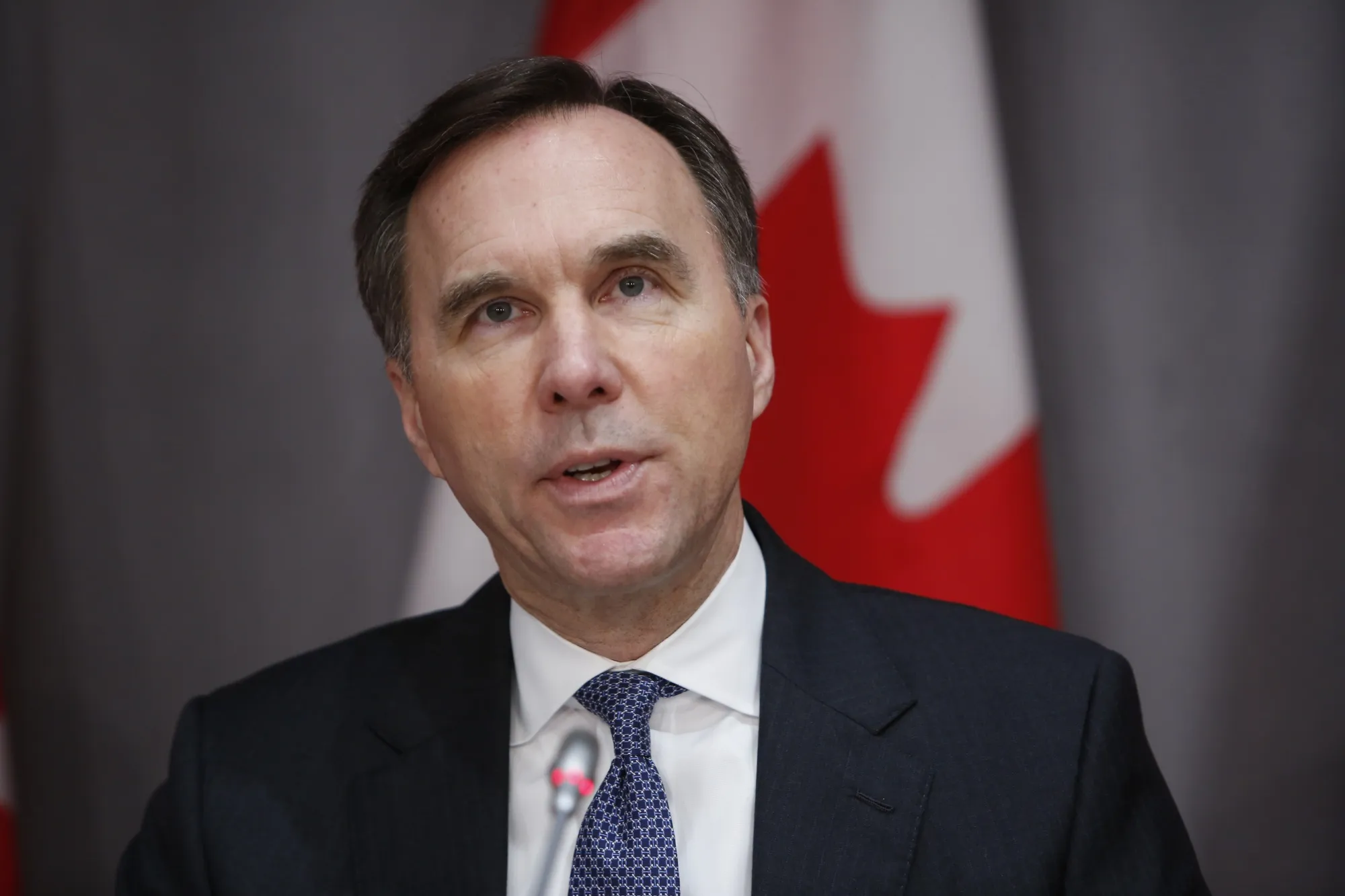 Bill Morneau speaks during an Ottawa news conference on March 18, 2020.