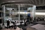 Members of the media gather inside the Tokyo Stock Exchange (TSE), operated by Japan Exchange Group Inc. (JPX), in Tokyo, Japan, on Thursday, Oct. 1, 2020.