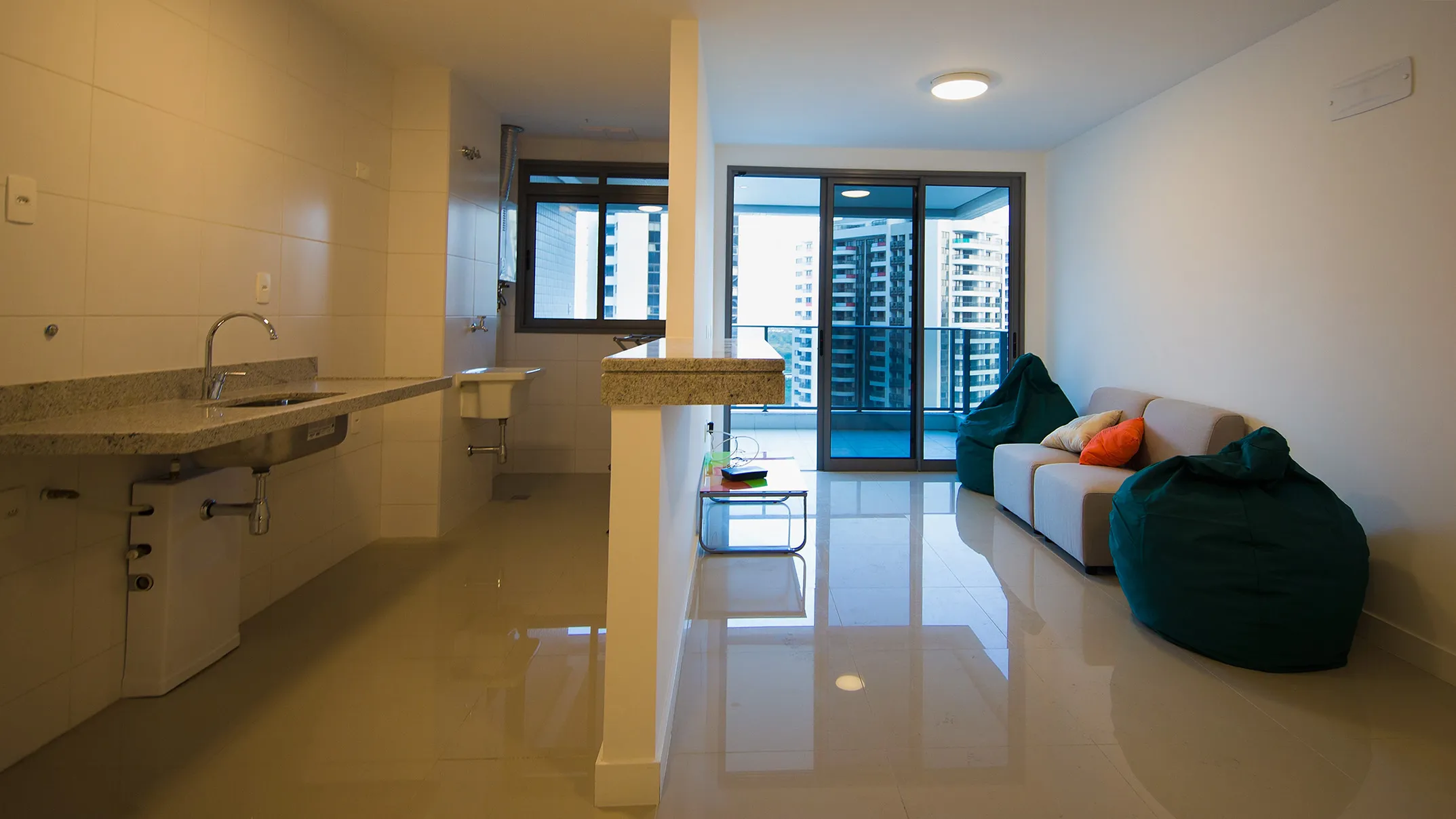 The kitchen and living room inside a unit within the Olympic and Paralympic Village for the 2016 Rio Olympic Games.
