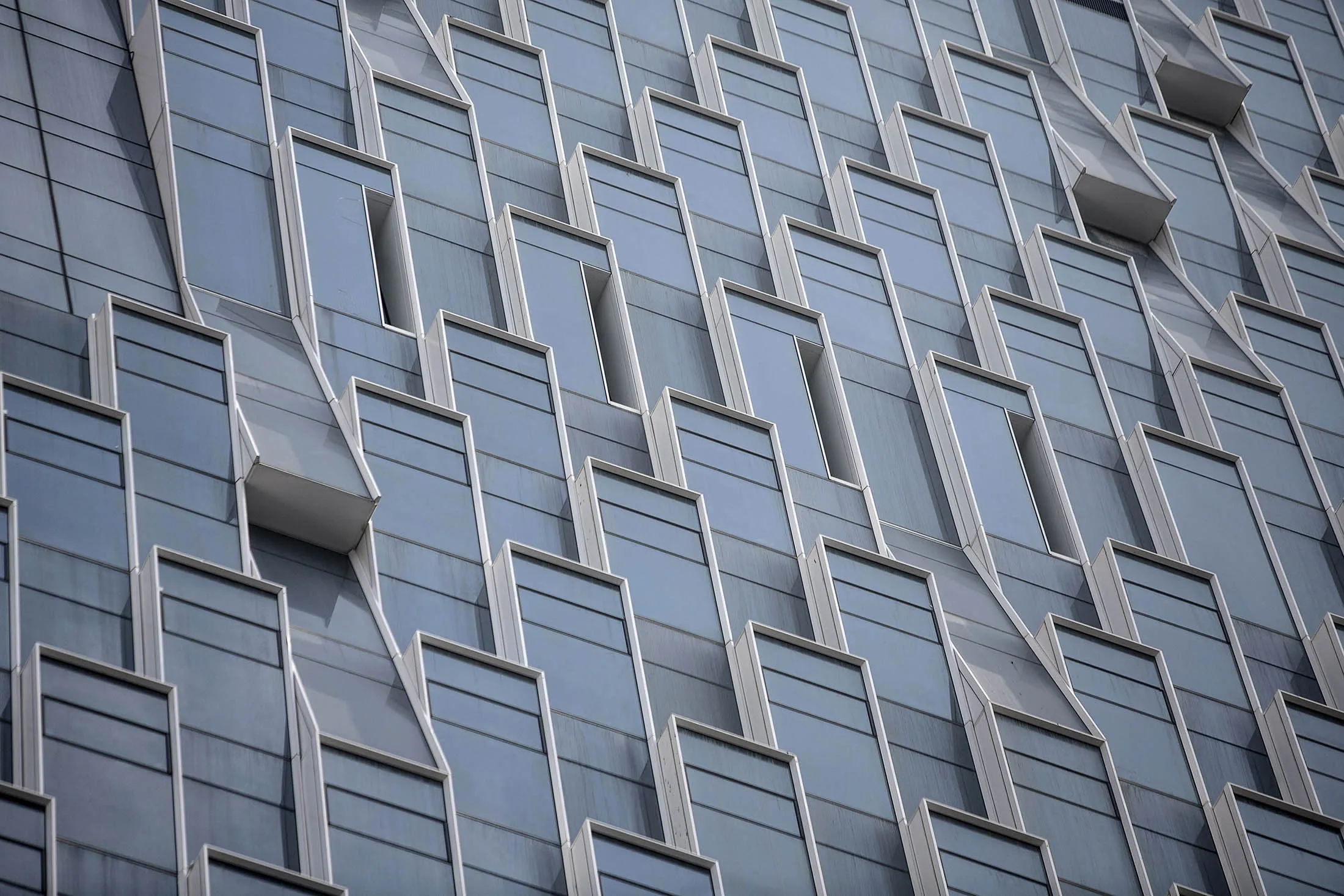 Side panels are seen on the exterior of Tencent Holdings Ltd.'s new under construction headquarters in Shenzhen, China, on Monday, Aug. 22, 2016. The new headquarters for Tencent is a $599 million project aimed at creating a campus-like atmosphere for the urban setting. Scheduled for completion next year, the Shenzhen skyscraper could become one of the largest labs for new internet services and connected devices.