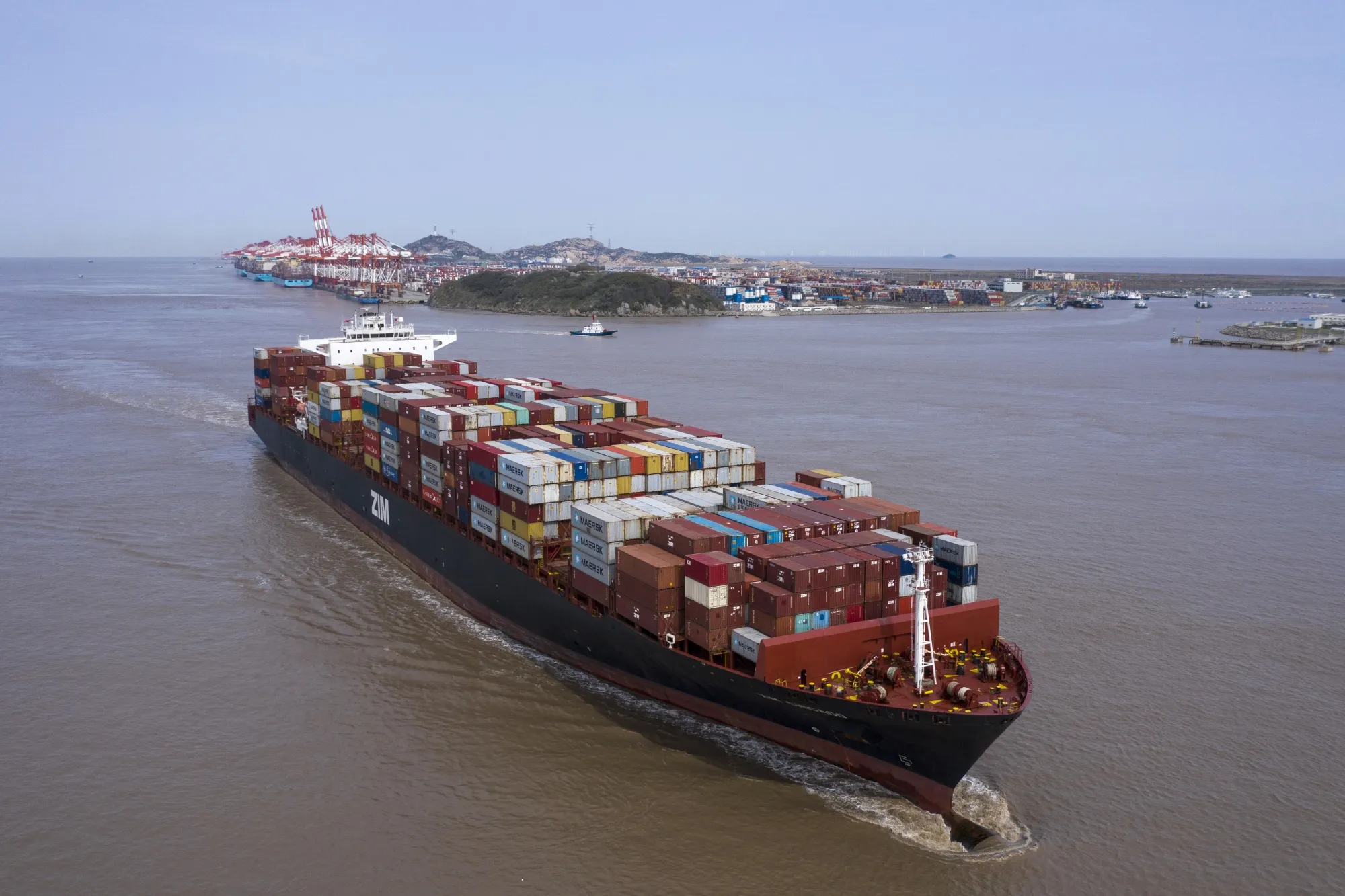 A container ship sails out of the Yangshan Deepwater Port in Shanghai, China, on March 23.