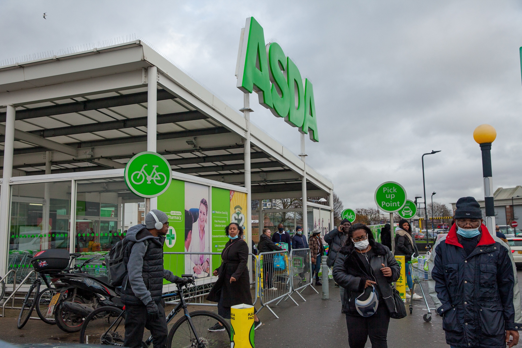 Shoppers race to Asda to snap up bargain buys in the store's mega sale -  including bras scanning for £2