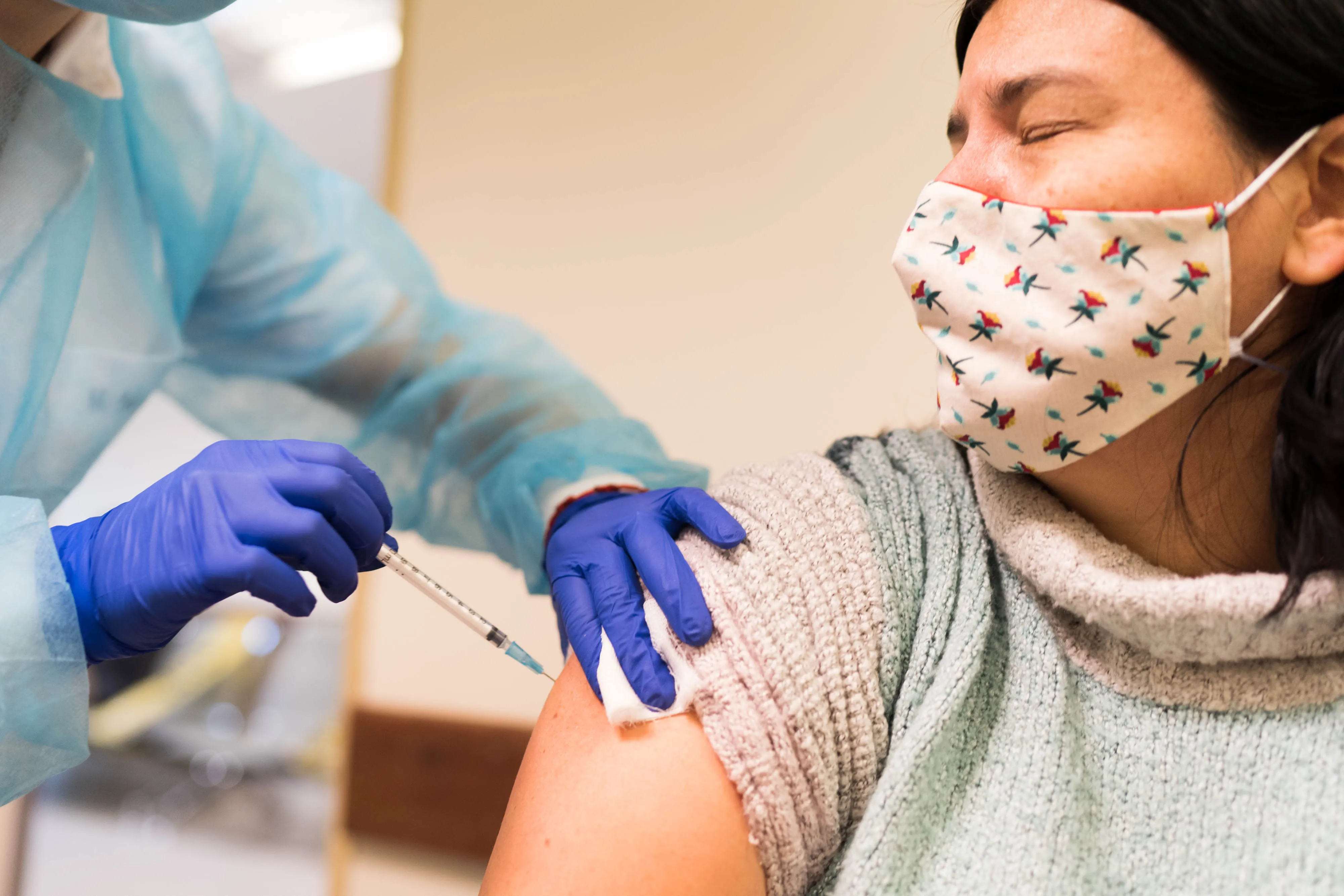 A healthcare worker administers a&nbsp;Covid-19 booster vaccine&nbsp;in Montevideo, Uruguay.