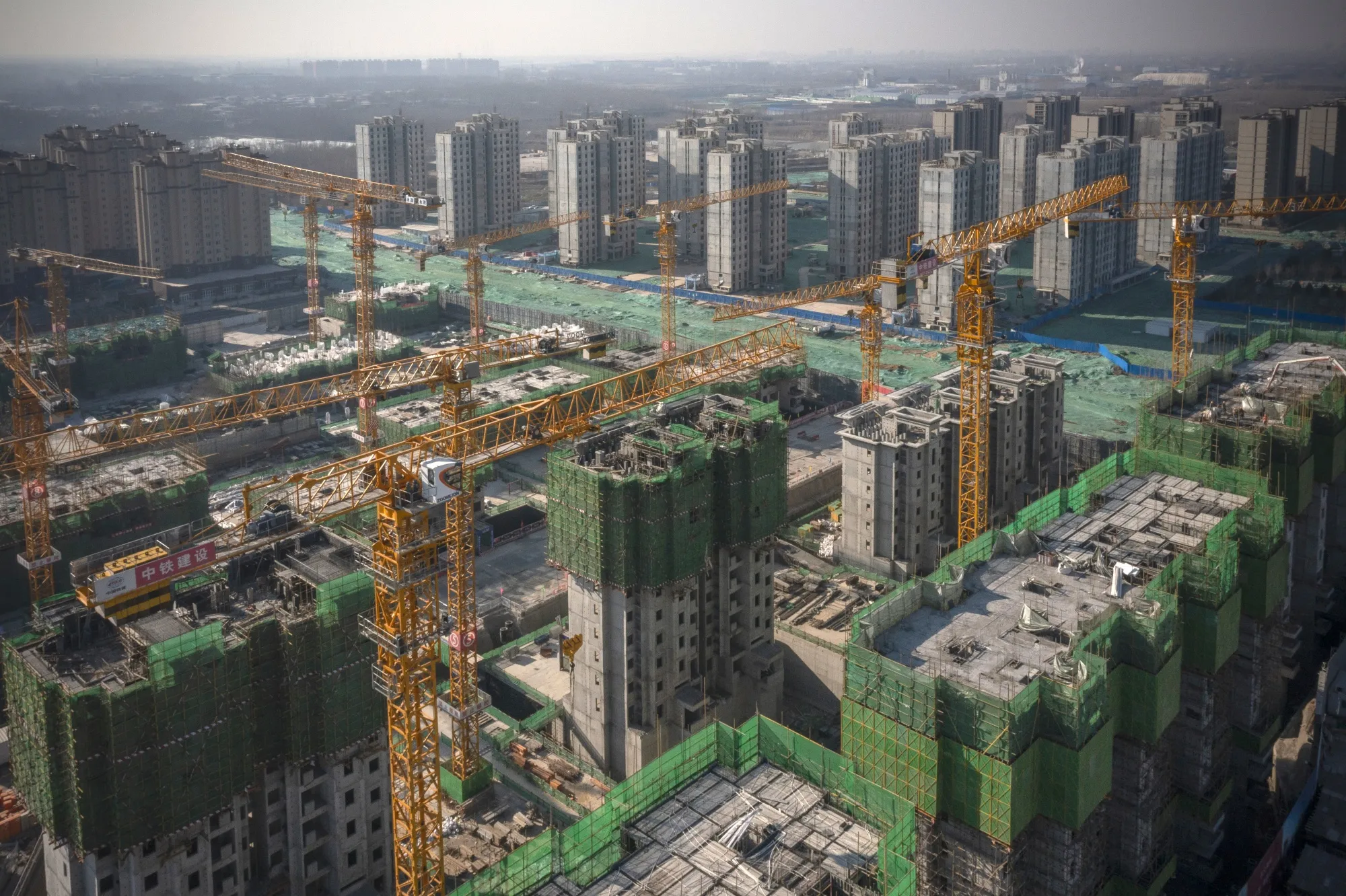 Unfinished apartment buildings at the construction site of a China Evergrande Group development in Beijing.