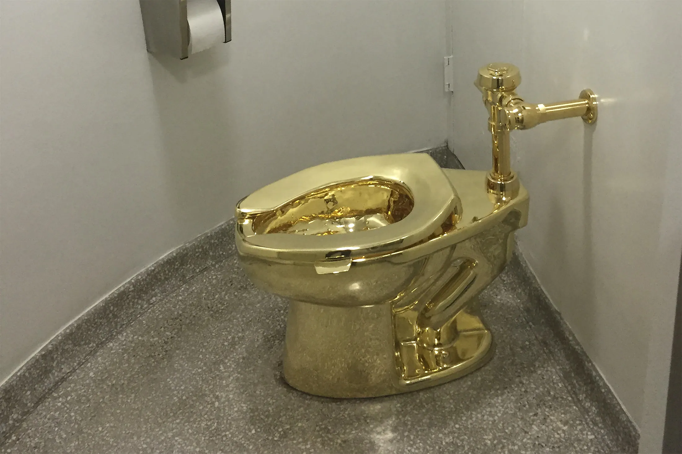 A fully functioning solid gold toilet, made by Italian artist Maurizio Cattelan, at the Guggenheim Museum in New York.