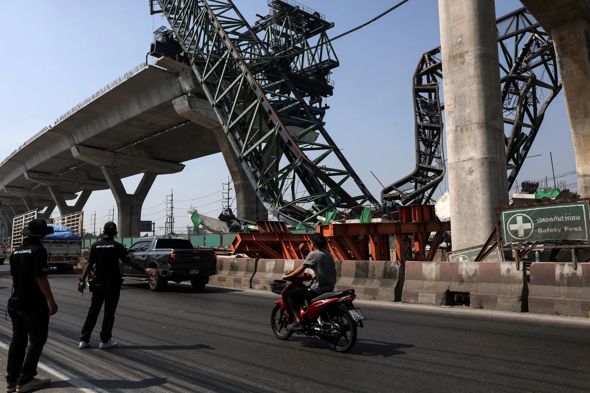 The wreckage of a collapsed construction crane in Samut Sakhon, Thailand, on Thursday, Jan. 15.
