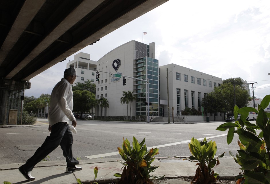 A man walks by the Camillus Health Concern in Miami, a clinic that provides medical care to the homeless and low-income, in 2009.