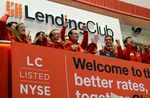 Lending Club founder Renaud Laplanche, center, rings the opening bell at the New York Stock Exchange on Dec. 11, 2014.
