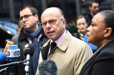 Bernard Cazeneuve speaks to reporters