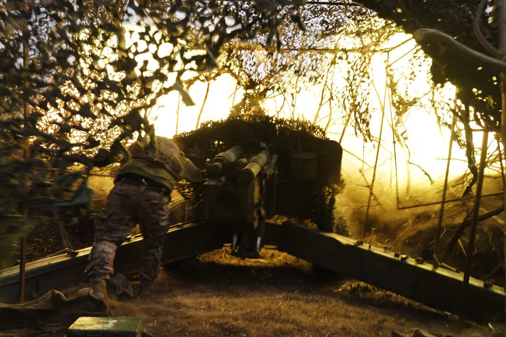 Ukrainian soldiers unload explosive charges in the direction of Bakhmut, on March 13.