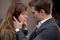 Christian (Jamie Dornan) seduces Anastasia (Dakota Johnson) with a look—and a bespoke suit.