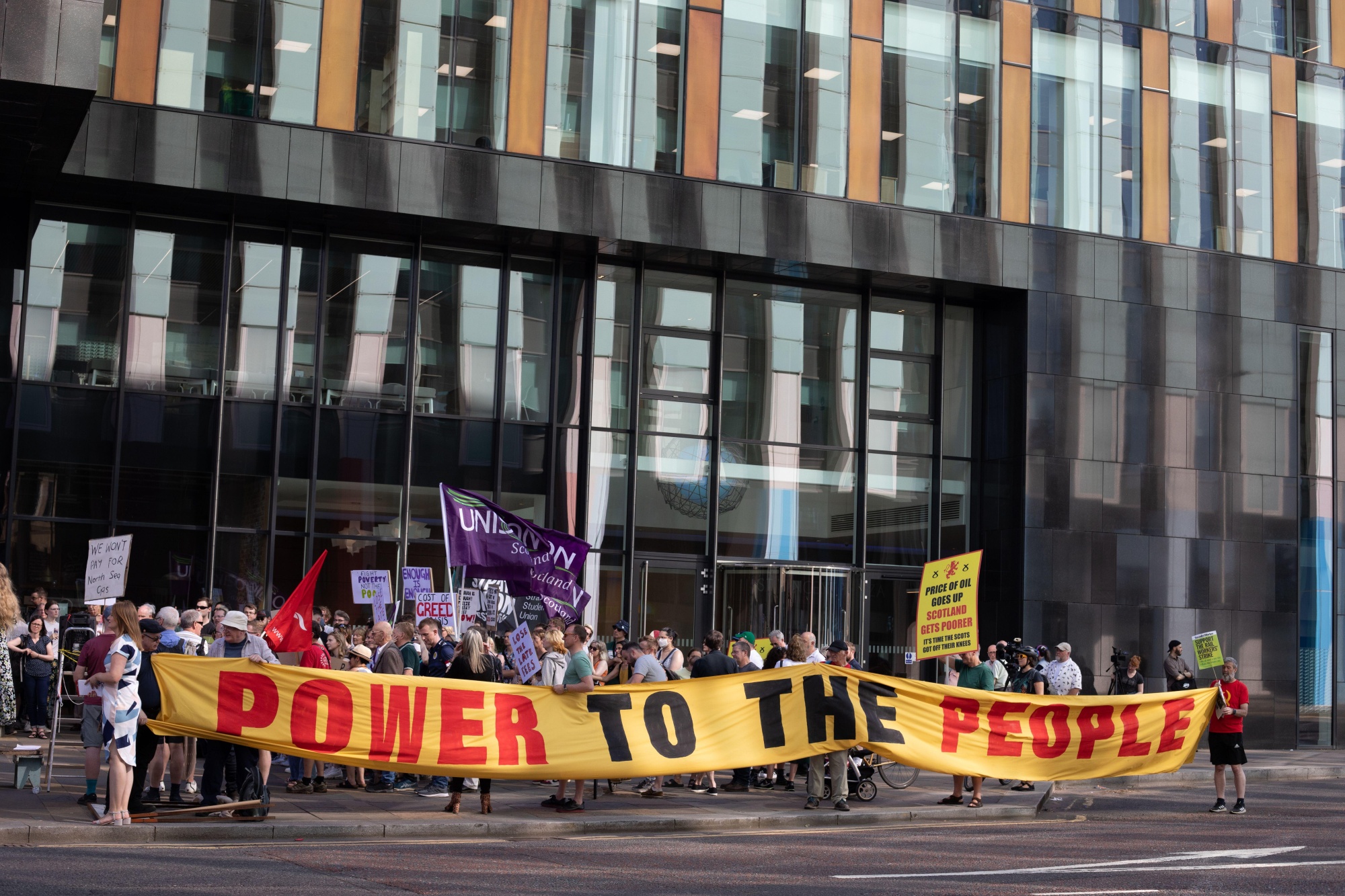 Glasgow, UK, 12th Aug 2022. Protest against fuel energy price rises and the cost of living criss, outside the headquarters of Scottish Power energy suppliers, in Glasgow, Scotland, 12 August 2022. Photo credit: Jeremy Sutton-Hibbert/Alamy Live News.