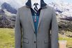 When looking for a vest, stick to neutral colors—blues, grays, etc.—reserving anything brighter (like the red seen here) for accents. Don't match the vest exactly to the jacket, either. Patagonia lightweight Synchilla Snap-T vest, $89, patagonia.com. Bonobos Jet-setter suit, $525, Daily Grind striped shirt, $98, and silk necktie, $78; bonobos.com.
