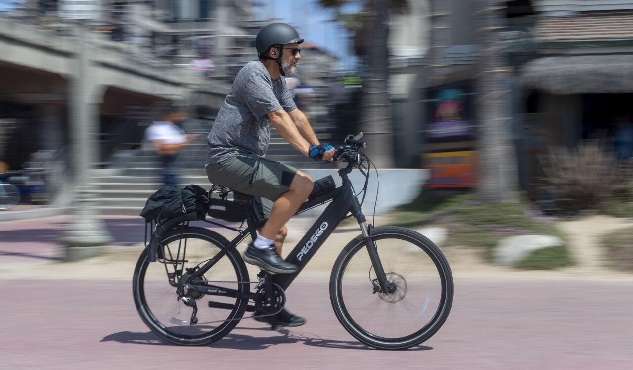 The Electric Vehicles We Need Now Are E-Bikes - Bloomberg