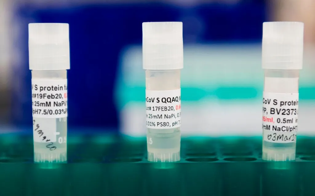 Three potential coronavirus vaccines sit in a tray at Novavax labs in Rockville, Maryland on March 20.