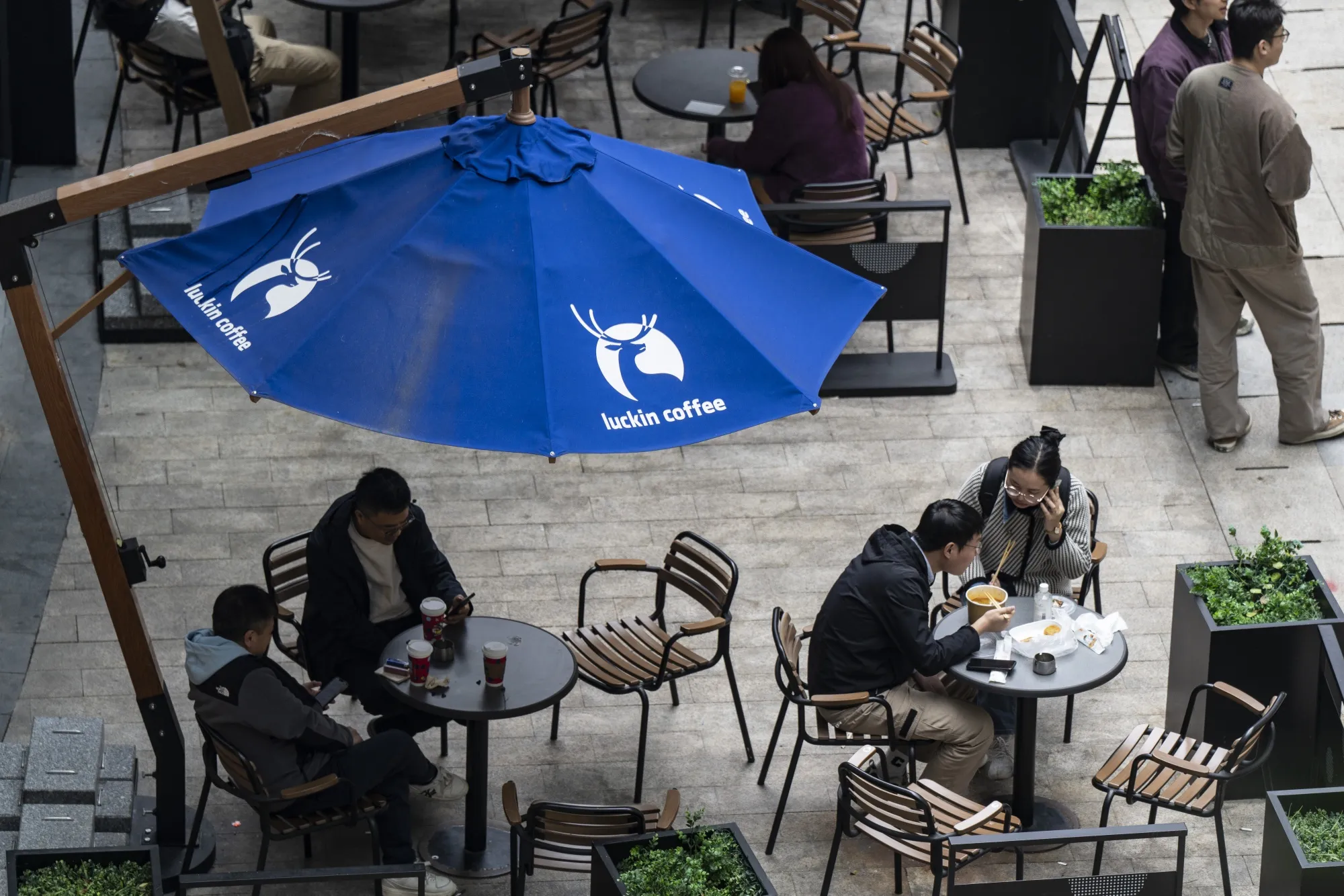 Customers at a Luckin Coffee Inc. store in Shanghai, China.