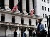NEW YORK, NEW YORK - APRIL 08: People walk by the New York Stock Exchange (NYSE) on April 08, 2019 in New York City. Markets are reacting as President Trump considers placing Herman Cain, a former pizza executive and presidential candidate, to a seat on the Federal Reserve Board. The Dow was down over 100 points in morning trading. (Photo by Spencer Platt/Getty Images)