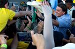 Jair Bolsonaro greets supporters during a protest in Brasilia on May 15.