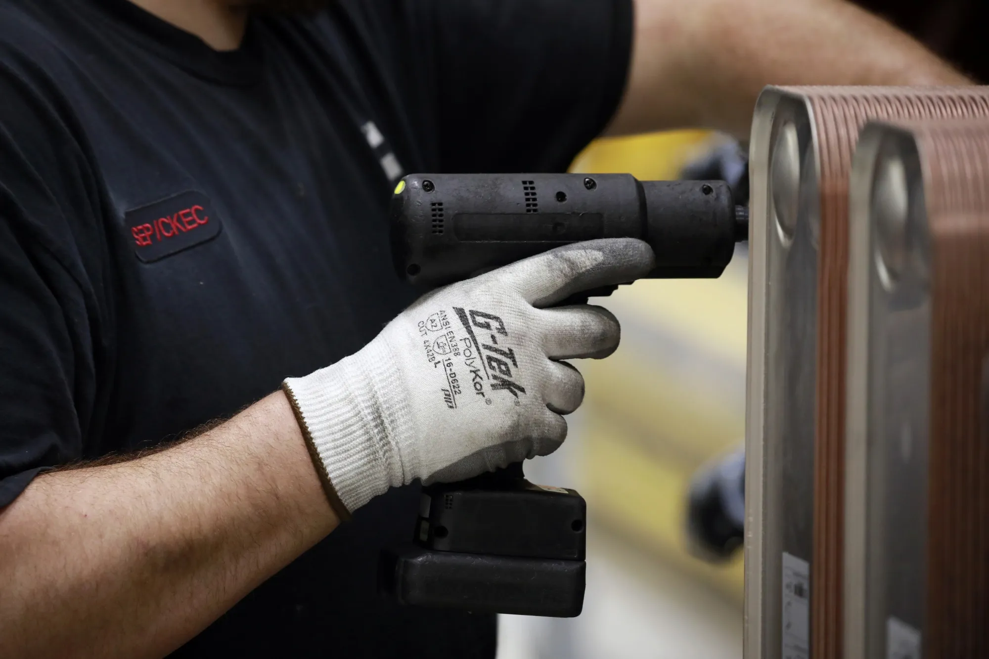 A worker&nbsp;assembles components on a diesel engine at a plant in Seymour, Indiana.