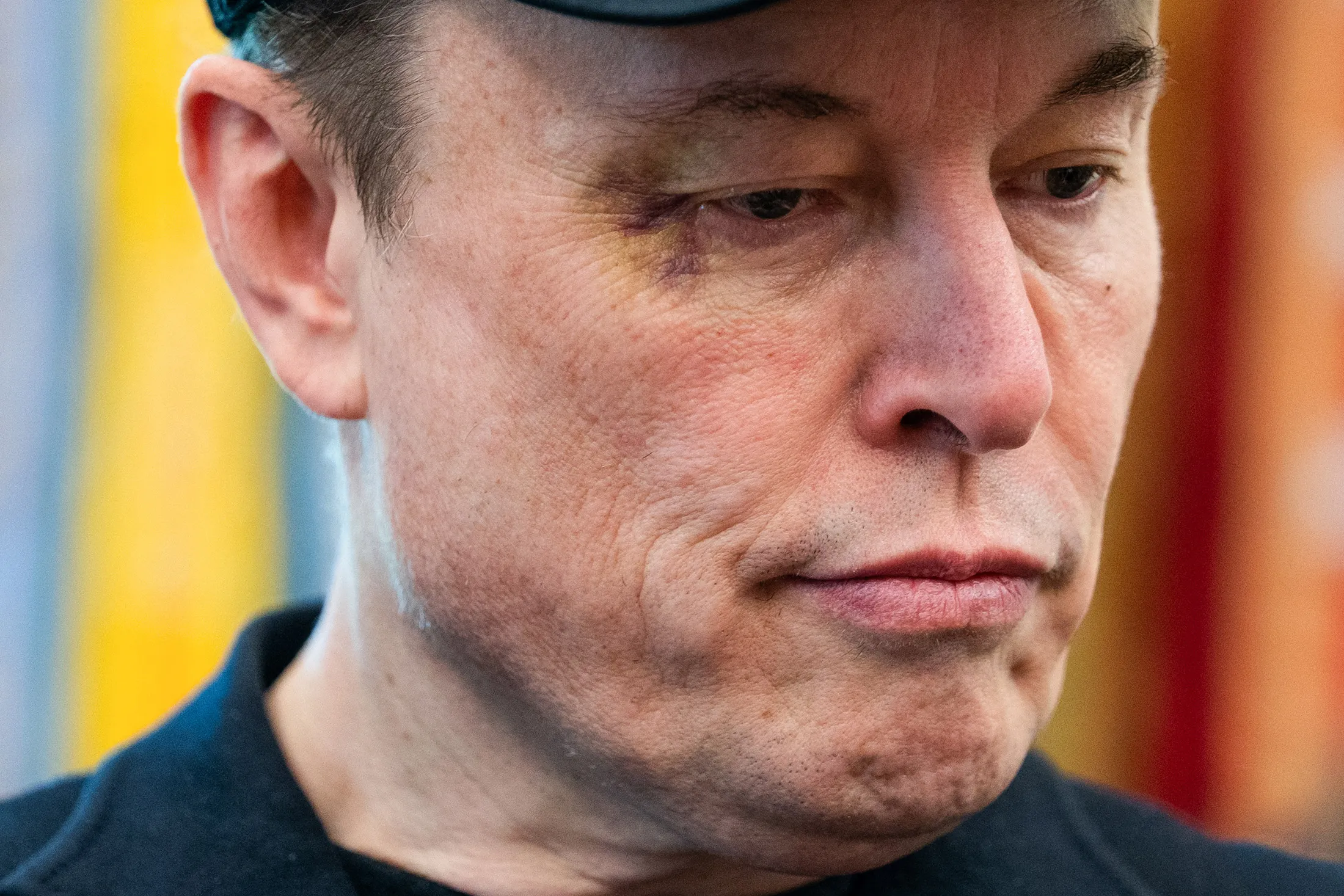 Musk looks on during a news conference with President Donald Trump on May 30.