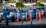 Drivers wait at a drive-thru Covid-19 test site in Riverside, California, on Dec. 9.