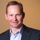Headshot of Mark D Okerstrom
