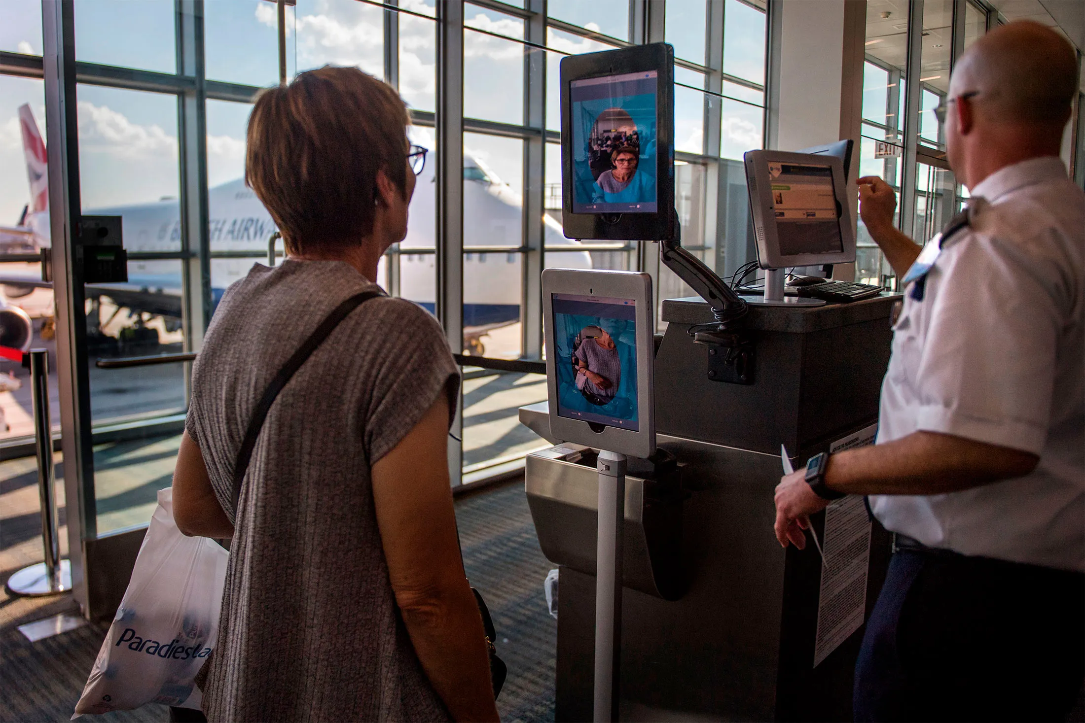 A woman boarding an SAS flight to Copenhagen goes through&nbsp;VeriScan, a facial recognition-verification system at Dulles International Airport in Dulles, Virginia, on Sept. 6, 2018.&nbsp;