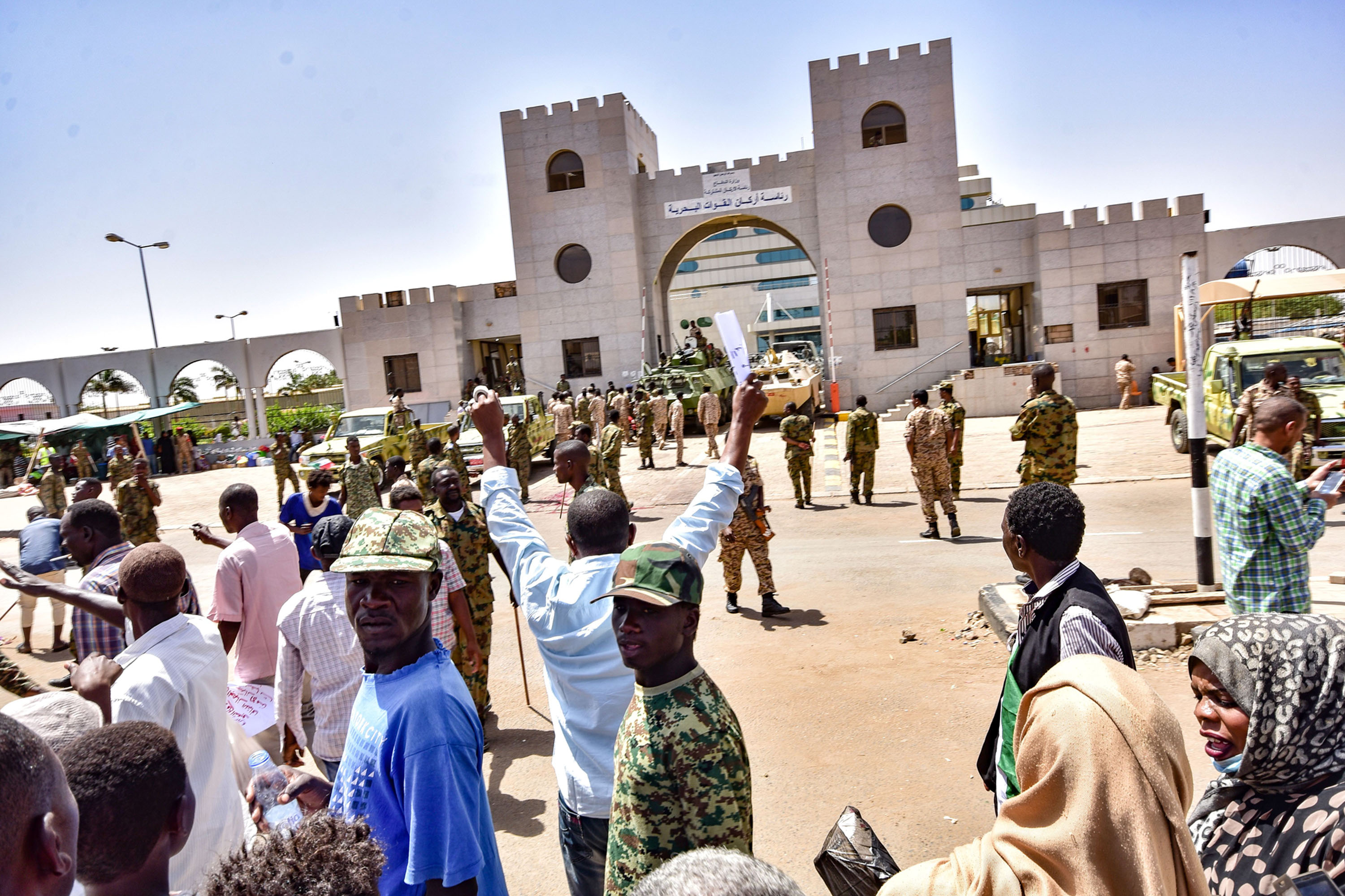 Demonstrators rally outside the army headquarters in Khartoum on April 13.