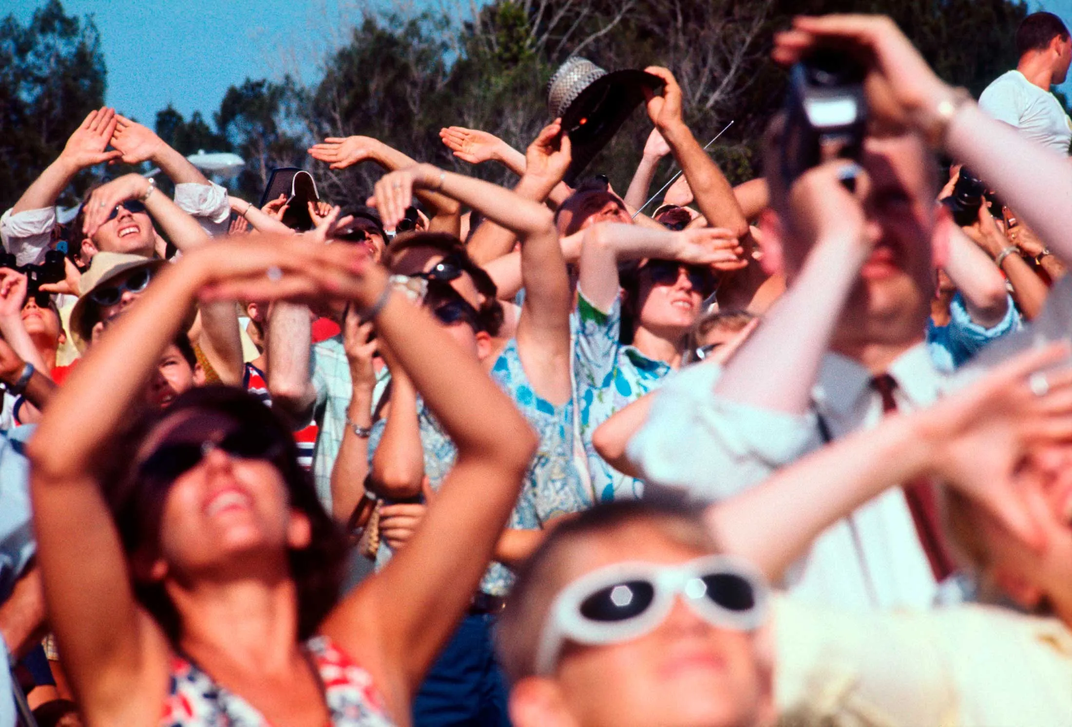 A crowd on the beach in Titusville, Fla., watches the launch of Apollo 11, the first manned mission to land on the moon, on July 18, 1969.&nbsp;
