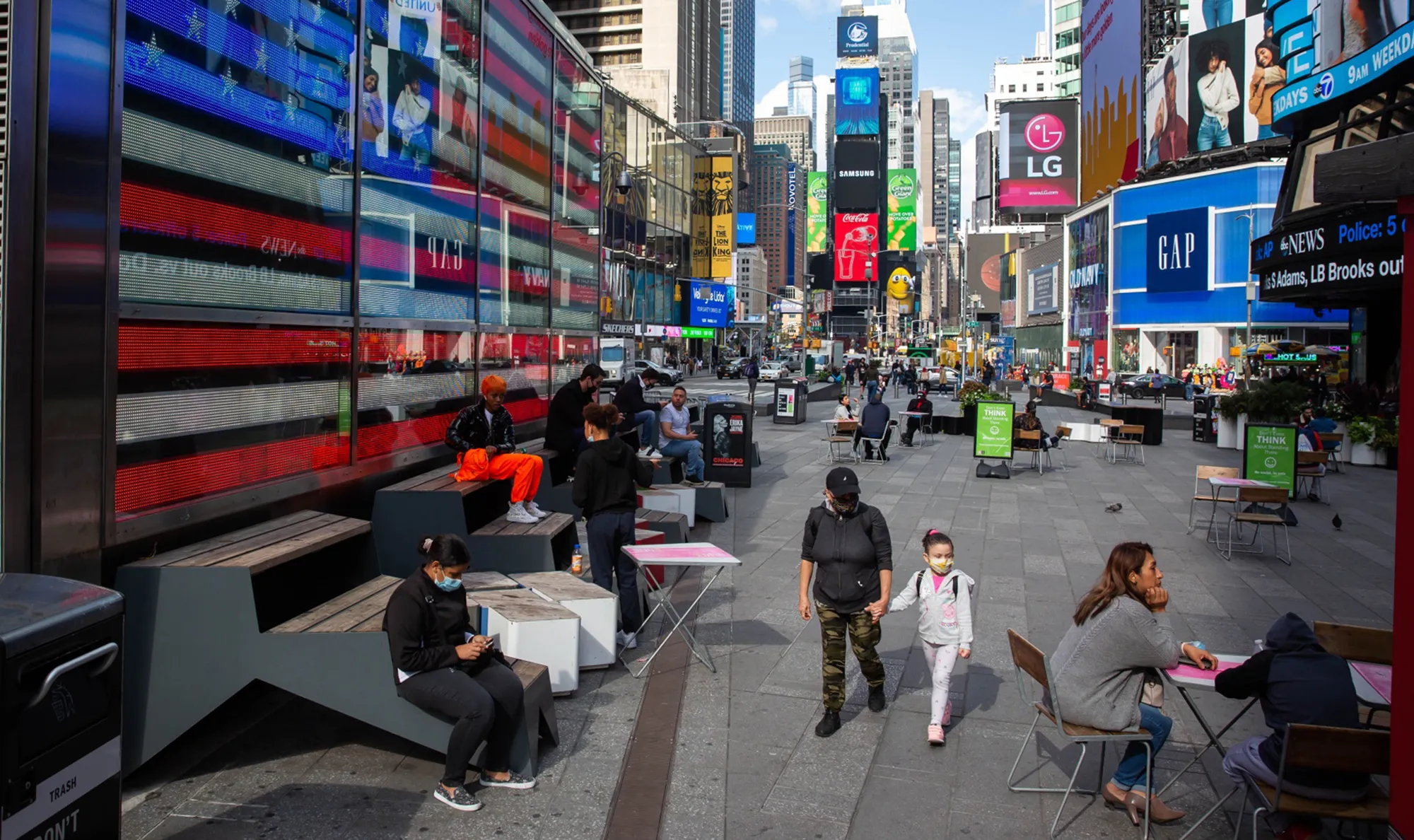 People sit&nbsp;in Times Square in New York, on&nbsp;Oct. 2.