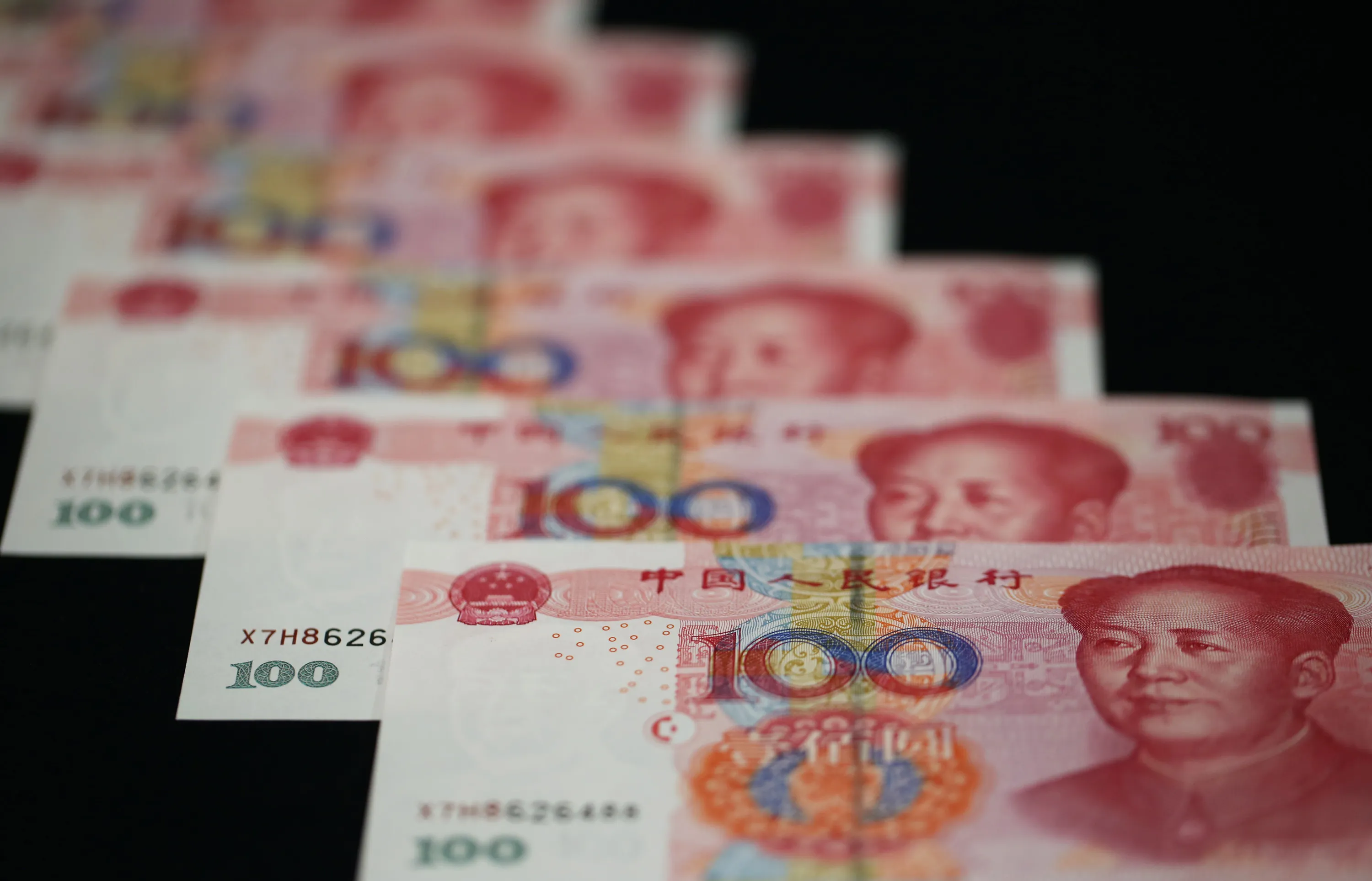 中国、人民元の基本的安定を維持へ-不確実性増す貿易の下支え狙う - Bloomberg