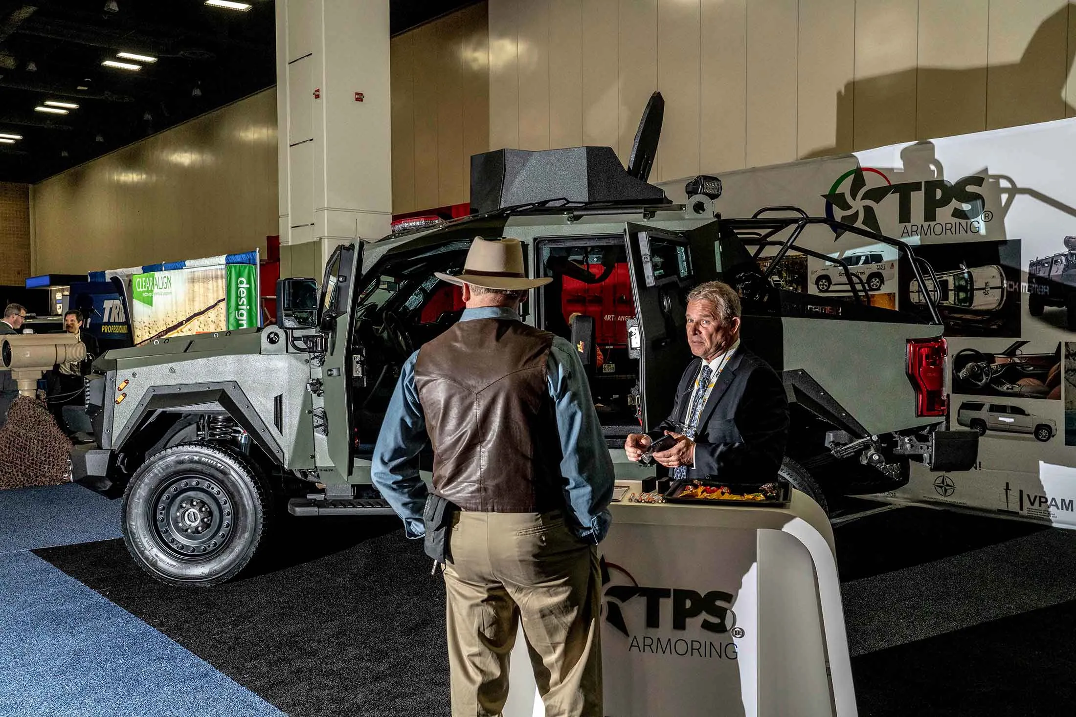 The booth for TPS Armoring, which makes armored vehicles, at the 2019 Border Security Expo.