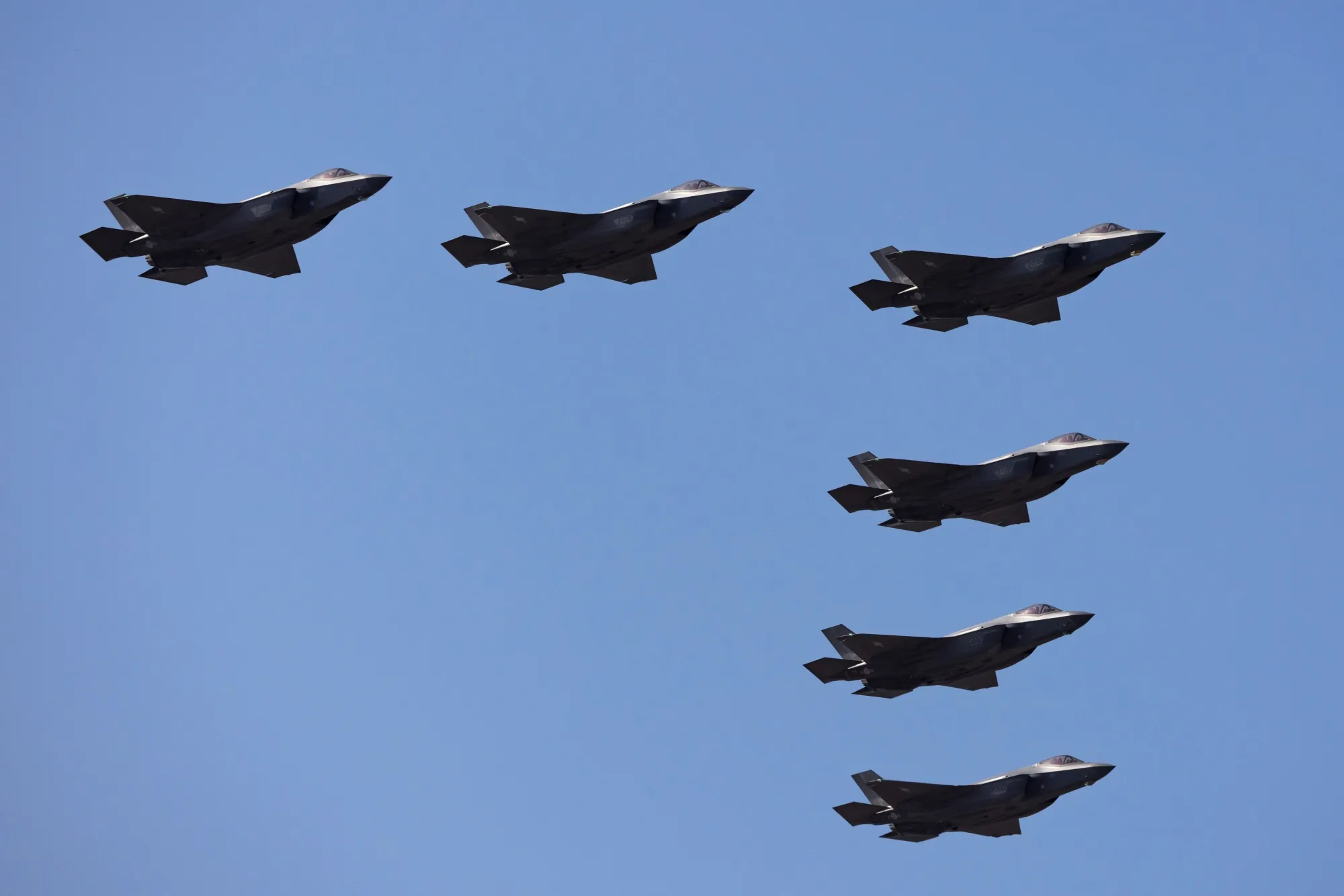South Korean Air Force F-35A stealth fighter jets, manufactured by Lockheed Martin Corp., perform maneuvers during the media day of the Seoul International Aerospace & Defense Exhibition (ADEX) at Seoul Air Base in Seongnam, South Korea, on Monday, Oct. 16, 2023.