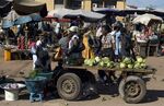 Vendors sell goods to customers at a market in Accra, Ghana, on&nbsp;Sept. 18, 2016.&nbsp;