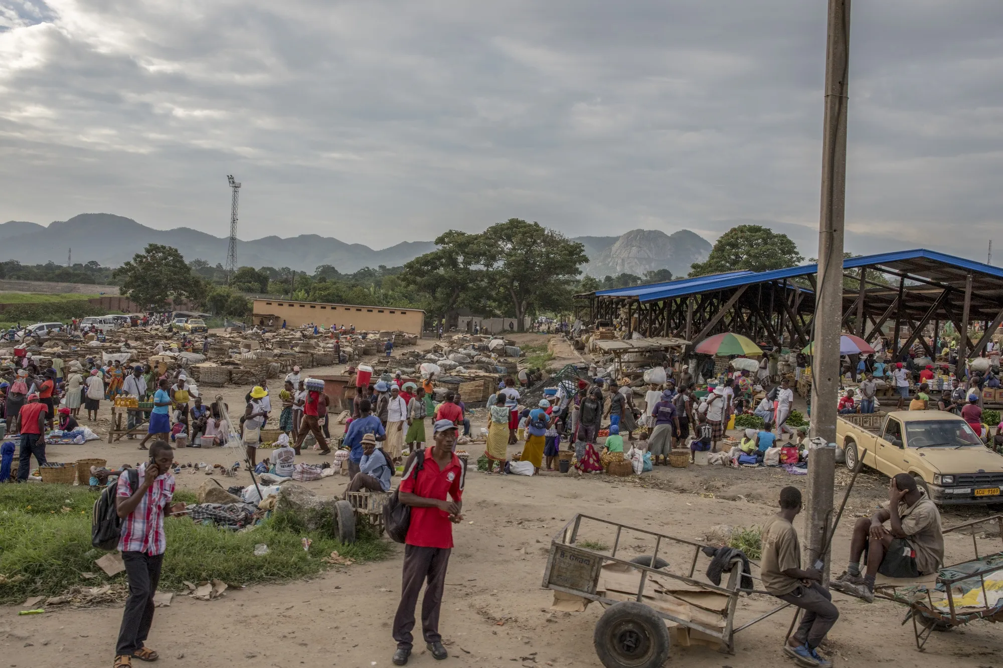 Shoppers and vendors at Sakubva market in Mutare, Zimbabwe.