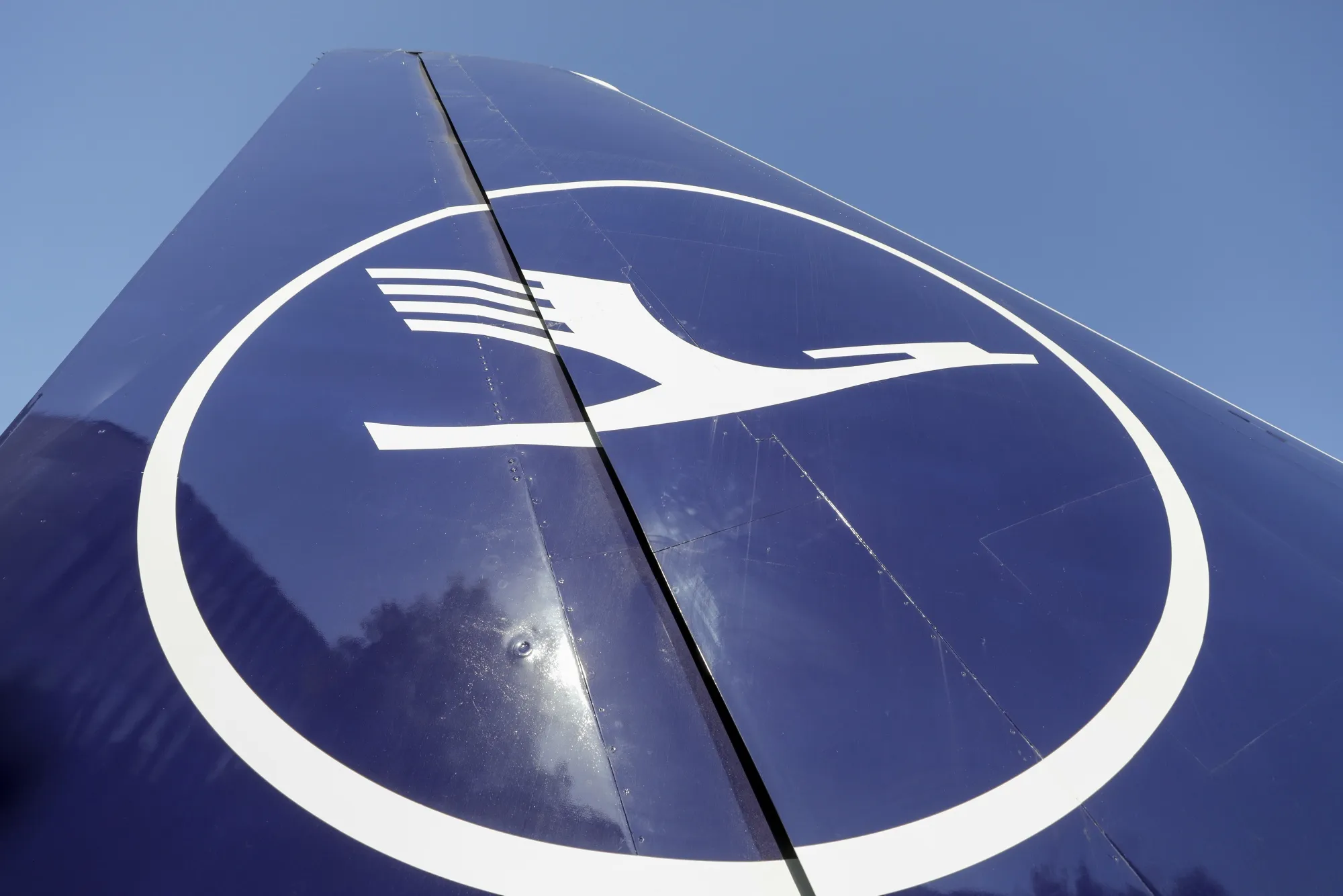 The Deutsche Lufthansa AG logo sits on the tail fin of a passenger aircraft at Frankfurt Airport, on&nbsp;June 24.