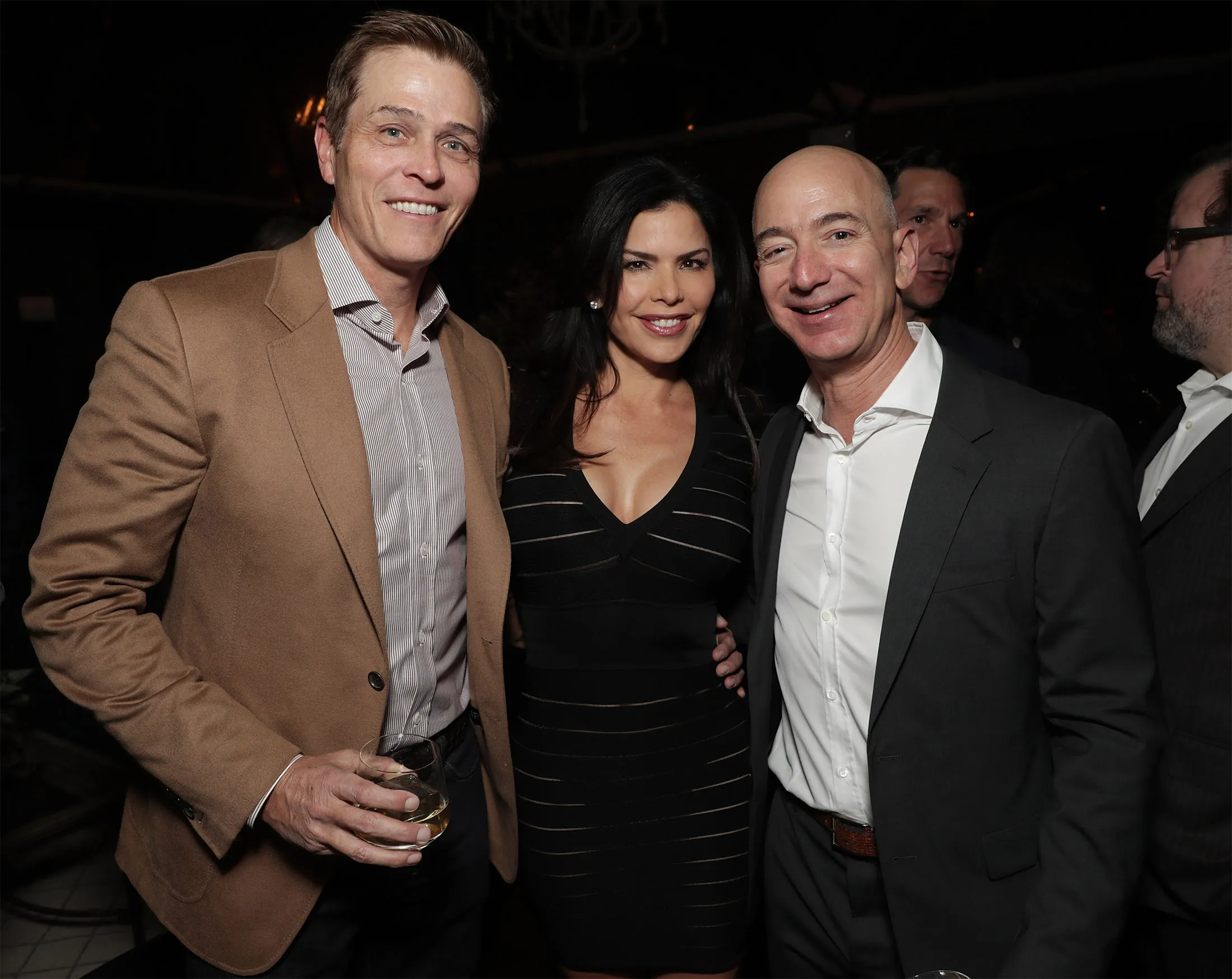 Patrick Whitesell, from left, Lauren Sanchez, and Jeff Bezos.