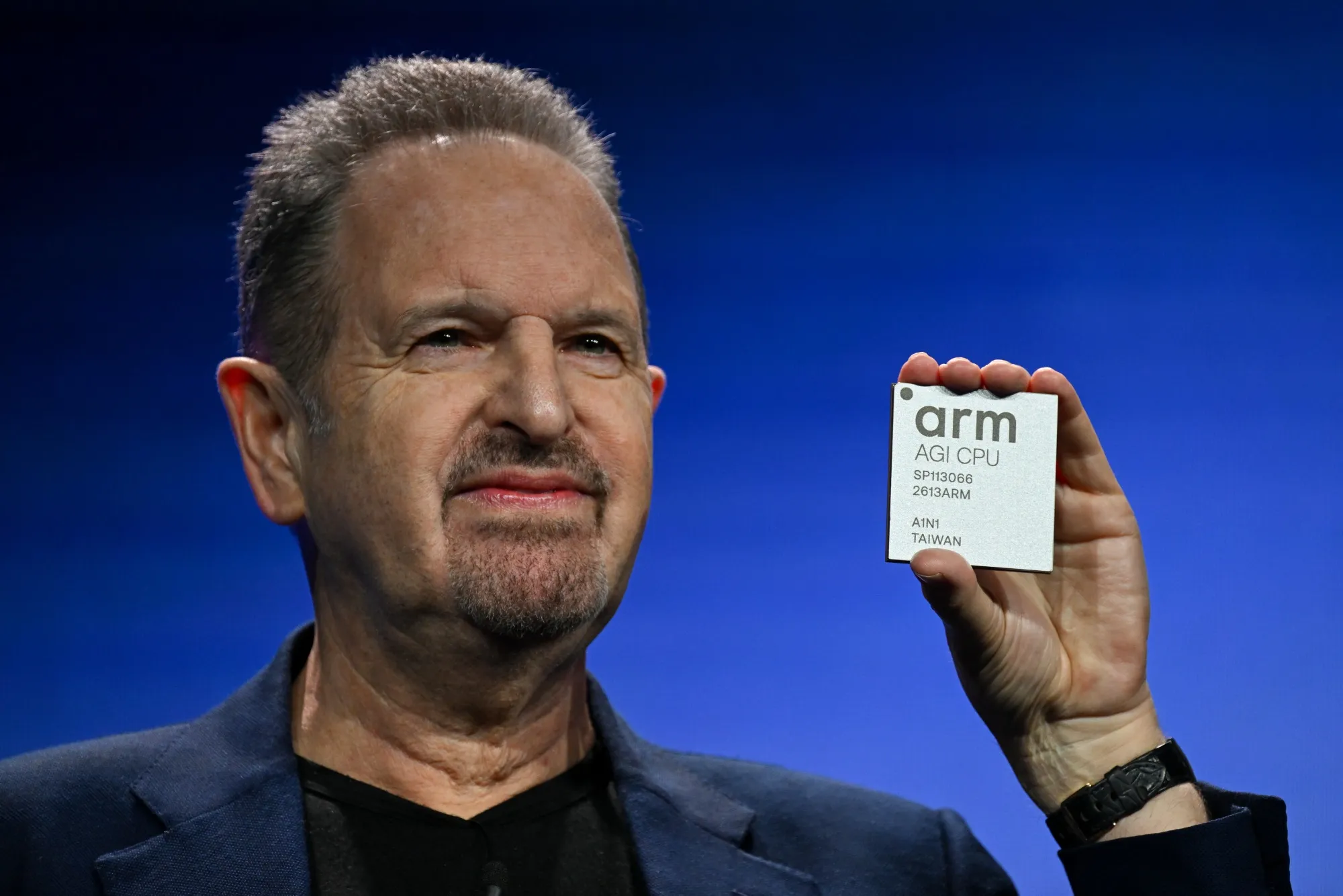 Rene Haas holds the AGI CPU chip during the Arm Everywhere event in San Francisco, California, on March 24.
