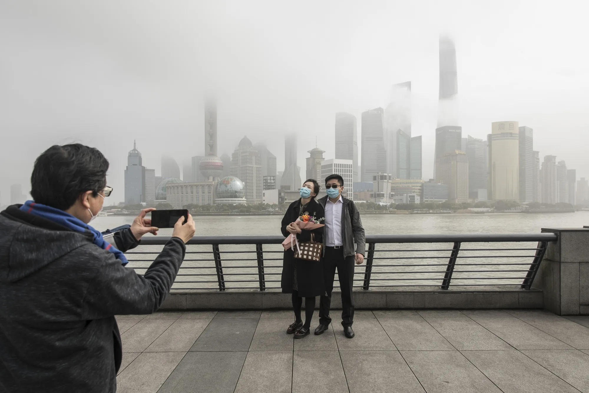 Shoppers and General Views of Shanghai as China Virus Data Changes Cloud Picture