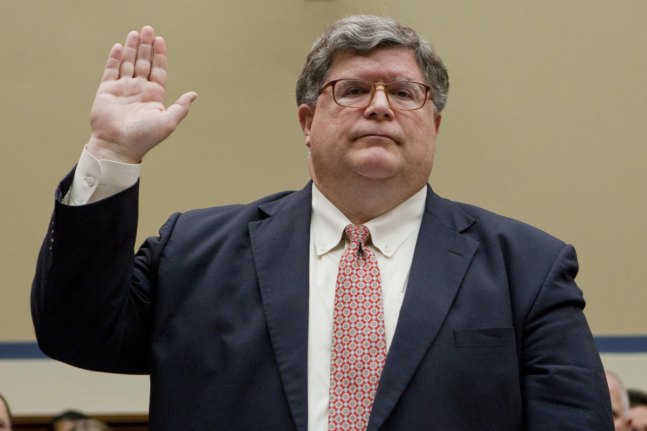 Brian Miller swears into a hearing in Washington on April 16, 2012.