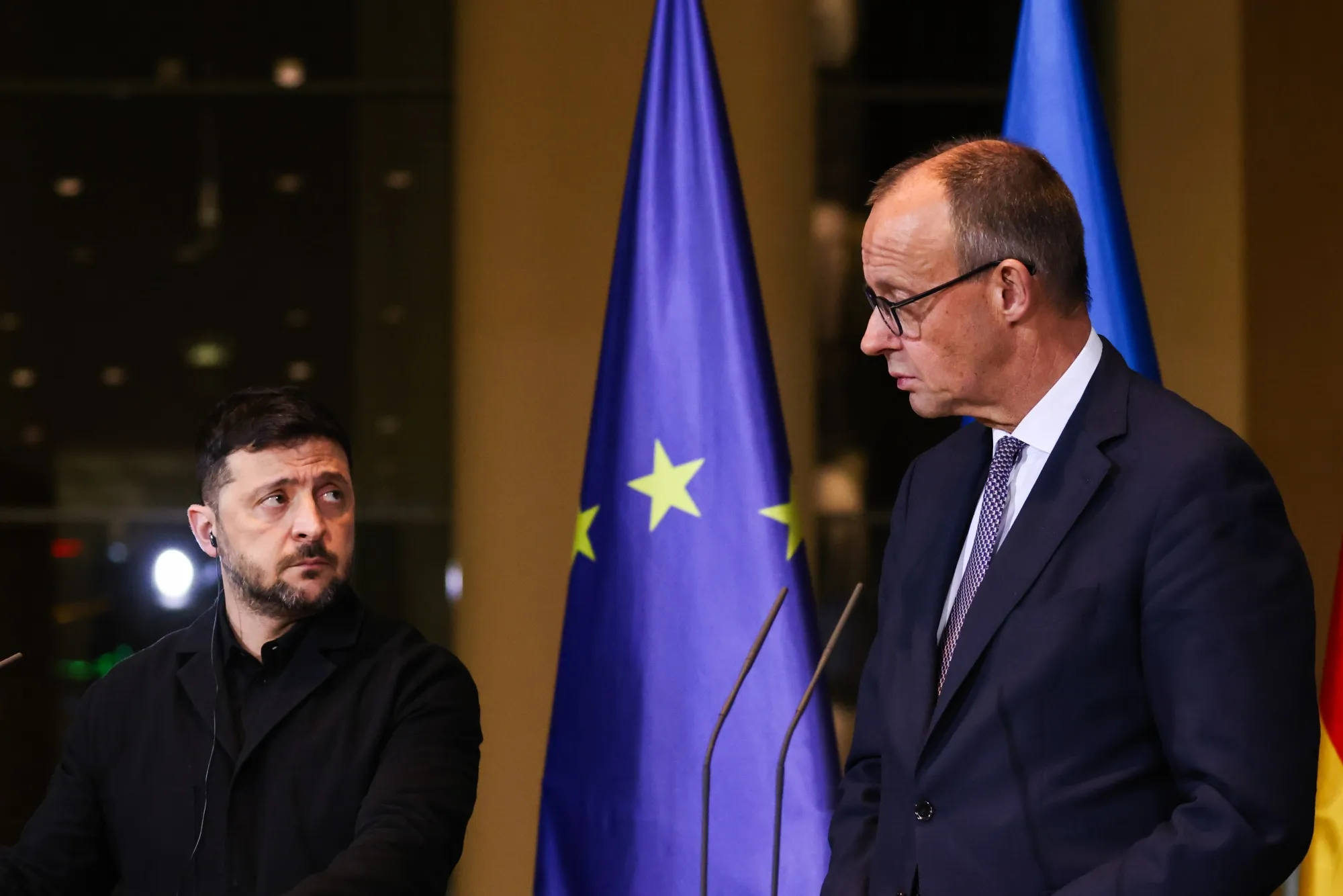 Volodymyr Zelenskiy, Ukraine’s president, left, and Friedrich Merz, Germany’s chancellor, during a news conference at the Chancellery in Berlin, Germany, in December 2025.